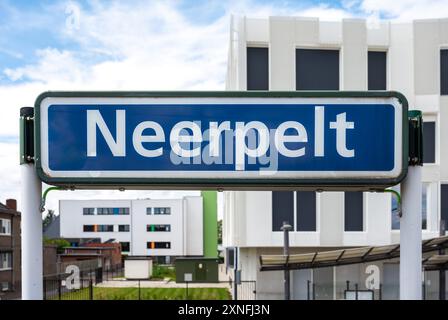 Neerpelt, Limburg, Belgium - July 10, 2024 - Blue sign of the Neerpelt local railway station Stock Photo