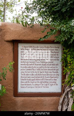 Santa Fe, NM - Sept. 23, 2021: Sign at the Inn and Spa at Loretto tells the history of the surrounding premises. Stock Photo