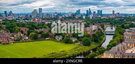 Aerial view of Manchester cityscape with skyscrapers and construction sites. Stock Photo