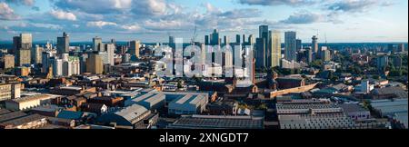 Aerial view of Manchester cityscape with skyscrapers and construction sites. Stock Photo