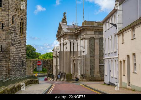 Looking down the Castle Ditch Caernarfon towards the old county hall. Building Stock Photo