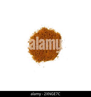 Closeup of raw organic ground cinnamon powder spice in a pile isolated on a white background from above, top view, copy space Stock Photo