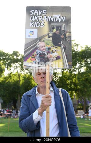 LONDON, ENGLAND - JULY 31 2024: Ukrainians have hope for peace in Ukraine during a demonstration at Parliament square, London, UK. ( Credit: See Li/Picture Capital/Alamy Live News Stock Photo