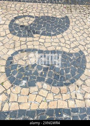 paving stones with shapes of clogs, Typical Dutch wooden shoes. Holambra, SP, Brazil. June 30, 2024. Stock Photo