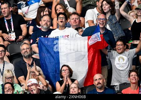 Paris, France. 31st July, 2024. Supporters of team France during the swimming 200m Butterfly Men Final during the Paris 2024 Olympic Games at La Defense Arena in Paris (France), July 31, 2024. Credit: Insidefoto di andrea staccioli/Alamy Live News Stock Photo