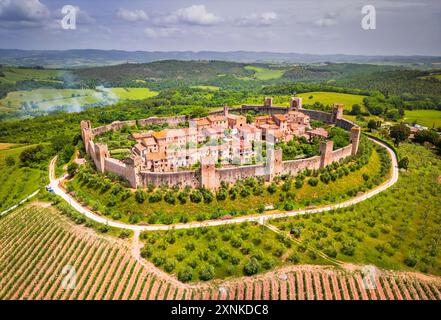 Monteriggioni, Italy. Aerial view of medieval Tuscan town on the hill. Tuscany scenic landscape with ancient walled city. Stock Photo