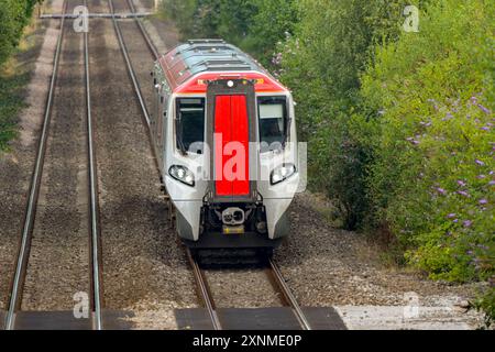 Pontyclun, Wales, UK. - 31 July 2024:  Head on view of one of the new Class 197 diesel commuter trains operated by Transport for Wales as it approache Stock Photo