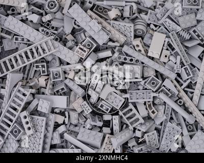 Tambov, Russian Federation - July 24, 2024 Background made of gray Lego blocks, bricks and pieces. Stock Photo