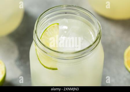 Cold Refreshing Lime Limeade with Sugar and Ice Stock Photo