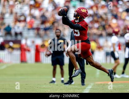 Washington Commanders cornerback Noah Igbinoghene (19) makes a catch during drills at practice at the OrthoVirginia Training Center at Commanders Park in Ashburn VA on July 28 2024 (Alyssa Howell/Image of Sport) Stock Photo