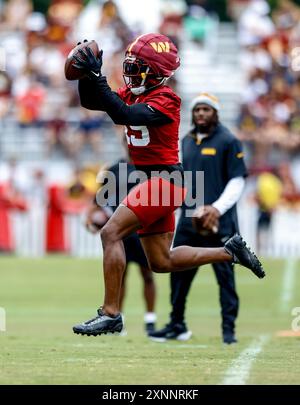 Washington Commanders cornerback Noah Igbinoghene (19) makes a catch during drills at practice at the OrthoVirginia Training Center at Commanders Park in Ashburn VA on July 28 2024 (Alyssa Howell/Image of Sport) Stock Photo