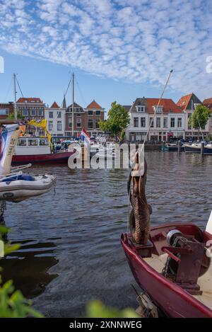 Wooden seamaid on the boat in Leiden marina, Netherlands Stock Photo