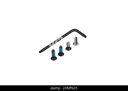 Screws and hexagons for screwing them in. Fasteners and tools. Isolate on a white background. Stock Photo