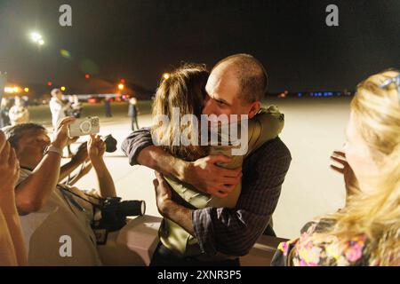 Evan Gershkovich greets colleagues from the Wall Street Journal at Andrews Air Force Base, after he was released from Russian prison as part of a prisoner swap, on Thursday, August 02, 2024. Credit: Aaron Schwartz/CNP Credit: dpa picture alliance/Alamy Live News Stock Photo