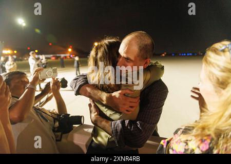 Evan Gershkovich greets colleagues from the Wall Street Journal at Andrews Air Force Base, after he was released from Russian prison as part of a prisoner swap, on Thursday, August 02, 2024. Credit: Aaron Schwartz/CNP Credit: dpa picture alliance/Alamy Live News Stock Photo