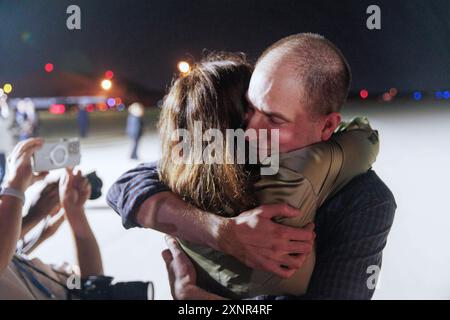 Evan Gershkovich greets colleagues from the Wall Street Journal at Andrews Air Force Base, after he was released from Russian prison as part of a prisoner swap, on Thursday, August 02, 2024. Credit: Aaron Schwartz/CNP Credit: dpa picture alliance/Alamy Live News Stock Photo