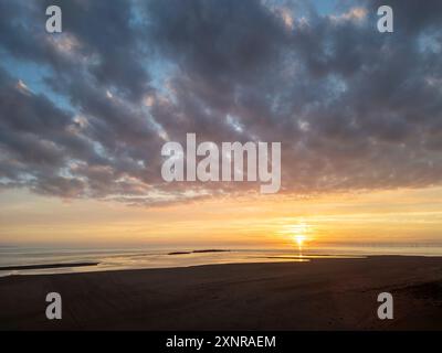 Aerial view of West Kirby sunset showing Hilbre Island, Wirral Peninsula, Merseyside, England Stock Photo