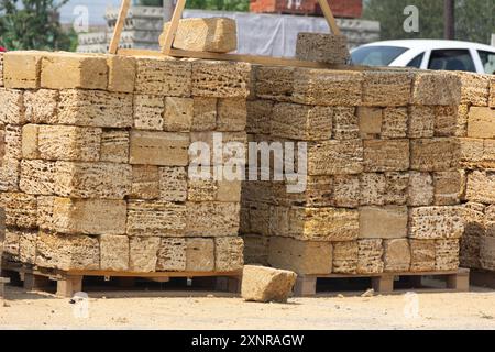 blocks for construction made of Crimean stone shell rock on pallets Stock Photo
