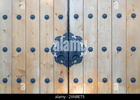 Old Korean wooden door with metal knocker Stock Photo