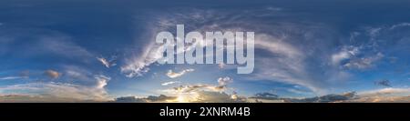 360 hdri sky before sunset with beautiful awesome clouds. Seamless panorama with zenith for use in 3d graphics or game development as sky dome or edit Stock Photo