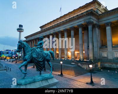 Elevated view of St George’s Hall Liverpool, with the Queen Victoria on horseback statue in the foreground at dusk. Stock Photo