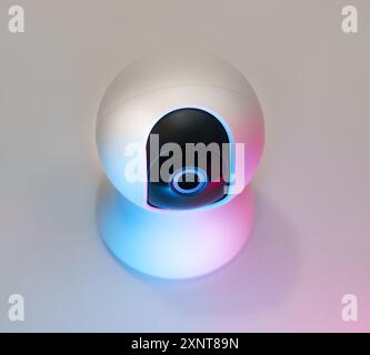 Security webcam smart home equipment lens. White colour pastel light. Stock Photo