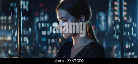 Portrait of Young Successful Caucasian Businesswoman Sitting at Desk Working on Laptop Computer in City Office Late At Night. Manager Plan Social Media Strategy for e-Commerce Project. Stock Photo