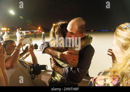 Evan Gershkovich greets colleagues from the Wall Street Journal at Andrews Air Force Base, after he was released from Russian prison as part of a prisoner swap, on Thursday, August 02, 2024. Credit: Aaron Schwartz/CNP /MediaPunch Stock Photo