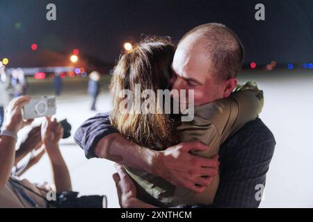 Evan Gershkovich greets colleagues from the Wall Street Journal at Andrews Air Force Base, after he was released from Russian prison as part of a prisoner swap, on Thursday, August 02, 2024. Credit: Aaron Schwartz/CNP /MediaPunch Stock Photo