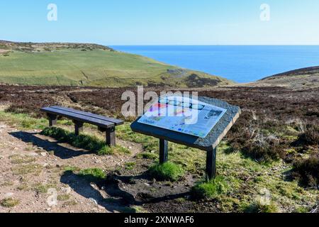 Information sign and bench on the path to Ousdale Broch, an Iron Age broch near the village of Ousdale, Caithness, Scotland, UK, Stock Photo