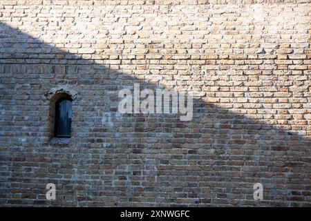 Stone texture in Tallinn. Ancient wall of stones with gray color. Background. Template. For design. Horizontal. Stock Photo