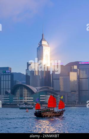A Red Sail Junk in Hong Kong Harbour, Hong Kong, Special Administrative Region of the People s Republic of China, China, Asia Copyright: NeilxFarrin 1 Stock Photo