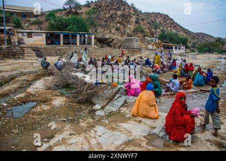 Men and women sitting in a hot spring in the lowlands of Eritrea, Africa Copyright: MichaelxRunkel 1184-12025 Editorial Use Only Stock Photo