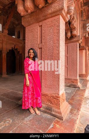 Young Indian woman in the Agra Fort (Red Fort), UNESCO World Heritage Site, Agra, Uttar Pradesh, India, South Asia, Asia Stock Photo