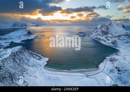 Winter aerial view of a beach covered with snow at sunset, Vik beach, Vestvagoy, Lofoten Islands, Norway, Scandinavia, Europe Stock Photo