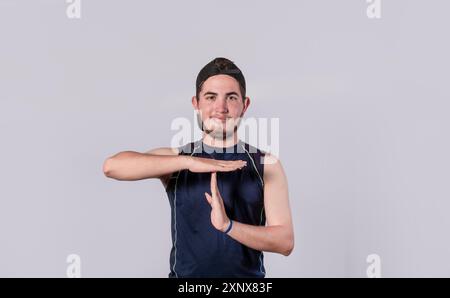 Man making time out gesture, latin guy making time out gesture Stock Photo