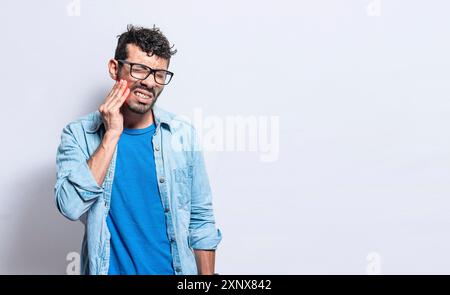 People with toothache, A man suffering from toothache isolated, person with hand on cheek with toothache. Toothache people concept isolated Stock Photo