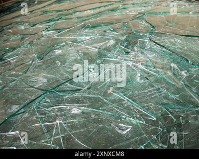 Pieces of broken window glass collected in a container Stock Photo