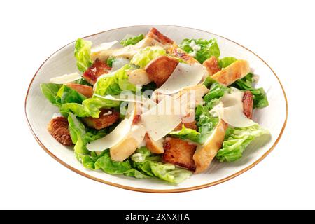 Caesar salad with grilled chicken meat, romaine leaves and Parmesan cheese, isolated on a white background with a clipping path Stock Photo
