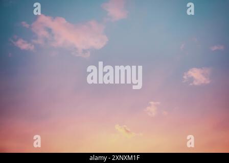 Sunset sky with few purple clouds, sky only background Stock Photo