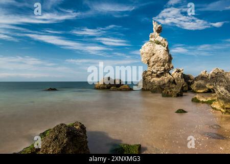 seascape with rocks slow shutter technic in photography on motion blur to long exposure Stock Photo