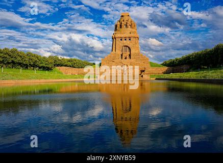 Monument to the Battle of the Nations in memory of the Battle of the Nations 1813 against Napoleon Bonaparte, cloudy mood, water reflection, Leipzig Stock Photo