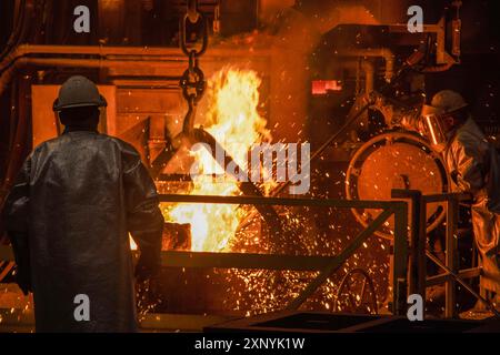 July 24, 2024 - Illinois, USA - Rock Island Arsenal-Joint Manufacturing and Technology Center personnel complete a foundry pour during a visit by the Chief of Staff of the Army Gen. Randy George and Sgt. Maj. of the Army Michael Weimer at the the center in Illinois, July 24, 2024. Rock Island Arsenal-Joint Manufacturing and Technology Center develops, manufactures and delivers readiness solutions through conventional and advanced manufacturing processes for the Army and Defense Department systems globally. (Credit Image: © U.S. Army/ZUMA Press Wire) EDITORIAL USAGE ONLY! Not for Commercial USA Stock Photo