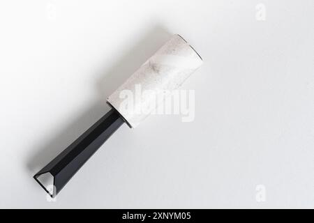Roller for cleaning clothes on white background. Closeup video for cleaning clothes Stock Photo