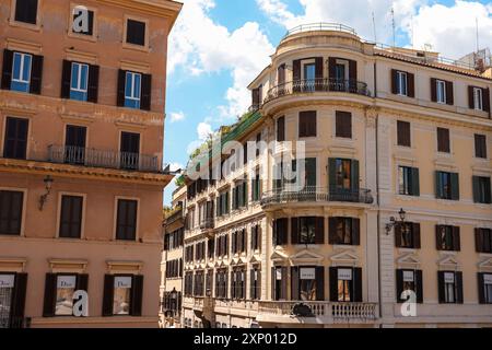 Rome, Italy- August 4, 2019: Dior and Prada store front on Via dei Condotti, a fashionable shopping street viewed from the Spanish steps Stock Photo