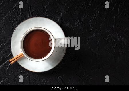 Hot chocolate, shot from the top on a dark background with a place for text Stock Photo