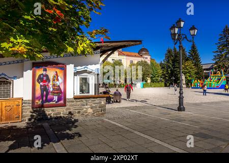 Razlog, Bulgaria, October 20, 2020: Downtown street square panoramic view with autumn trees and people Stock Photo