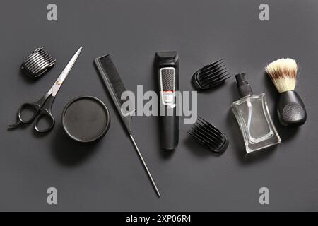 Modern trimmer and shaving accessories on black background Stock Photo