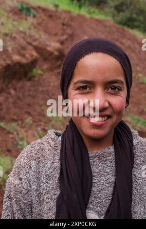 Teenage berber girl with headscarf, Ait Blal, azilal province, Atlas mountain range, morocco Stock Photo