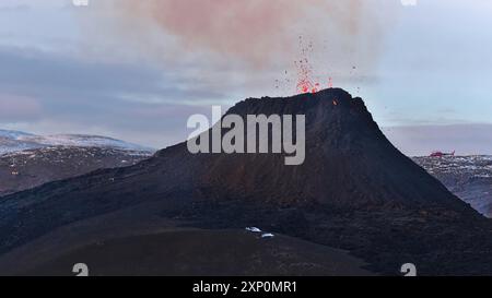 Beautiful view of smoking erupted volcano in Geldingadalir valley near Fagradalsfjall mountain, Grindavik, Reykjanes peninsula, southwest Iceland Stock Photo